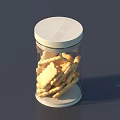 Crispy Cookies in Clear Glass Jar With Wooden Lid on Dark Surface
