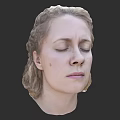 Peaceful Closed Eyes of Blonde Woman with Smooth Facial Skin and Golden Hair