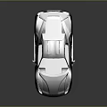Silver Sports Car With Sleek Modern Design And Large Alloy Wheels On Reflective Surface