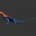 Colorful Lizard With Orange Head Blue Body On Dark Background Showing Vibrant Scales