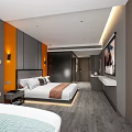Modern Stylish Hotel Room Interior With Comfortable Bed And Decorative Wall Art