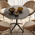 Stylish Round Table With Wicker Chairs Cushioned Seats And Fruit Bowls
