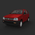 Red Suzuki Compact Car Front View With Headlights And Dark Background