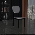 Modern Dining Chair With Black Frame And White Seat In Minimalist Design