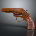 Old Rusted Revolver Weapon With Copper Metal Body And Vintage Design