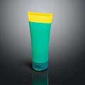 Green Yellow Blue Cosmetic Beauty Tube With Modern Glossy Finish On Black Background
