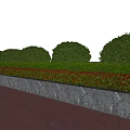 Well Trimmed Round Shrubs With Low Red Green Bushes Stone Wall And Red Brick Pavement