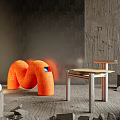 Modern Orange Curved Single Chair With Soft Plush Design And Gray Wall Setting