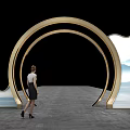 Golden Door Arch With Circular Frames Decorative Design And Person Walking Through