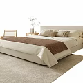 Modern Double Bed With Beige Sheets Brown Blanket Pillows Bedside Tables Light Rug And Chair