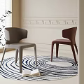 Gray And Brown Modern Dining Chairs On Blue White Spiral Pattern Rug With Decorative Wall