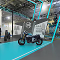 Exhibition Booth Setup Featuring CRYPTTO Sign More To Explore And Motorcycles