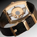 Luxury Gold Case Watch With Black Leather Strap And Intricate Dial Design