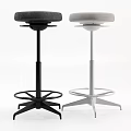 Modern Bar Stools With Black And Silver Bases Padded Seats And Swivel Design