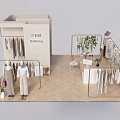 BeiDingWei Clothing Store Interior With Hanging Racks Clothing Displays Green Plants And Herringbone Floor