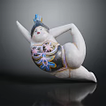 Elegant Decorative Furniture Sculpture Featuring Female Figure With Colorful Patterns And Blue Headdress