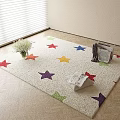 Square Rug with Colorful Star Patterns on Light Wooden Herringbone Floor and White Flowers