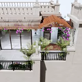 Serene Rooftop Garden Design With Wooden Pergola Purple Flowers And Lush Greenery