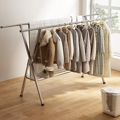 Stainless Steel Foldable Clothes Drying Rack With Hanging Fur Collar Coats In Bright Indoor Room 3d model