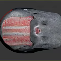 Red And Gray Patterned Helmet Shaped Weapon With Distinctive Design Elements 3d model