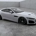 White Jaguar Sports Car With Modern Sleek Exterior In Gray Indoor Space