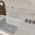 Stainless Steel Kitchen Sink With Gold Faucet On Marble Countertop In Modern Kitchen