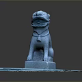 Blue Lion Statue In Sitting Pose With Decorative Collar On Brick Pedestal