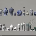 Decorative Traditional And Modern Ceramic Vessels In Blue White Green On Shelf