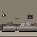 Modern Three Seater Sofa With Beige Upholstery Mixed Pattern Cushions And Black Floor Lamp