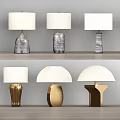 Modern Table Lamps With Transparent Glass And Golden Metal Bases In Various Shapes