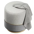 Modern Round Gray Upholstered Ottoman With Houndstooth Blanket And Gold Trim