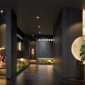 Hotel Corridor With Dark Walls Black Tiled Floor Rock Sculpture Circular Decor And Green Plants