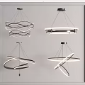 Modern Chandeliers With Curved Twisted Ring Designs And Illuminated Features