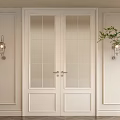 White Framed Glass Paneled Double Doors With Wall Sconces And Potted Greenery
