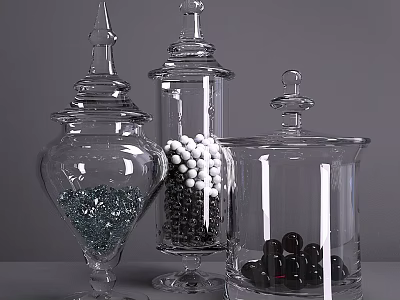 Clear Glass Vases With Lids Containing Decorative Balls And Pebbles On Gray Surface 3d model