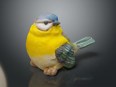 Small Bird Decorative Figurine With Blue Head Yellow Body And Green Wings 3d model