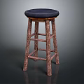 Rustic Wooden Bar Stool With Dark Blue Padded Seat And Textured Legs
