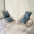 Stylish Metal Frame Rocking Lounge Chairs With Soft Blue Cushions For Balcony Relaxation