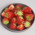 Ceramic Plate Filled With Fresh Whole And Sliced Strawberries With Green Leaves