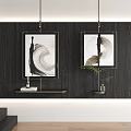 Abstract Paintings Black Framed On Dark Wooden Wall With White Brushstroke Decorative Shelves Books Plants