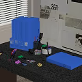 Organized Office Desk With Blue Folders File Boxes Stationery And Supplies