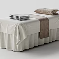 Comfortable Massage Bed Featuring White Linen Sheet Folded Towels Brown Pillow And Towel
