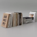 Stacked Books and Magazines with GOOD VIBES ONLY CHANEL Covers and Person Portrait