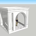 White Architectural Structure With Arched Doorway And Standing Person
