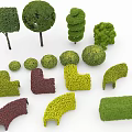 Various Shaped Garden Shrubs In Green Yellow Red And Geometric Designs