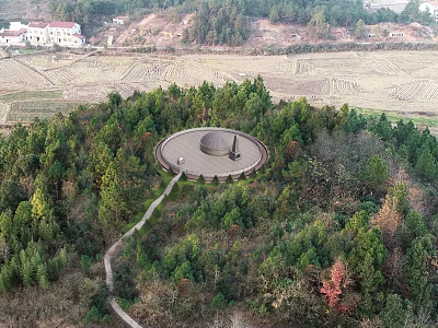 Aerial View Of Circular Building Surrounded By Lush Trees Path Farmland And Distant Houses 3d model