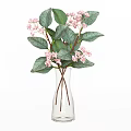Transparent Glass Vase With Pink Small Flowers And Green Leaves For Home Decor