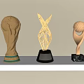Golden Trophies With Football Golf Ball And Metal Structure Designs On White Shelf