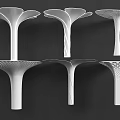 Six White Modern Columns Featuring Unique Top Shapes And Textured Patterns