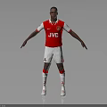 Football Player In Red And White Jersey With JVC Logo Standing In Athletic Pose